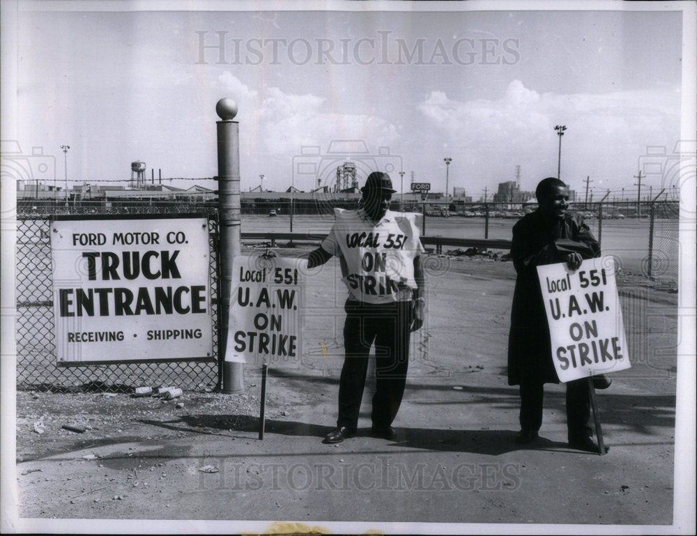 1975 Two pickets gate  Ford Co plant truck - Historic Images