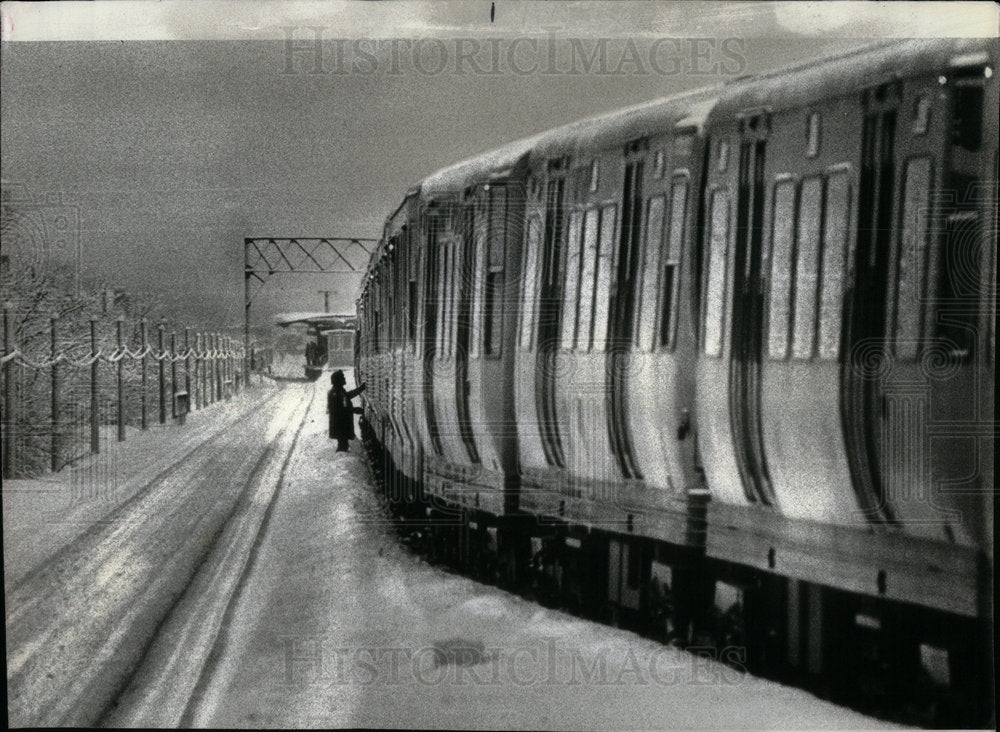 1979 Motorman Views predicament of repaired - Historic Images