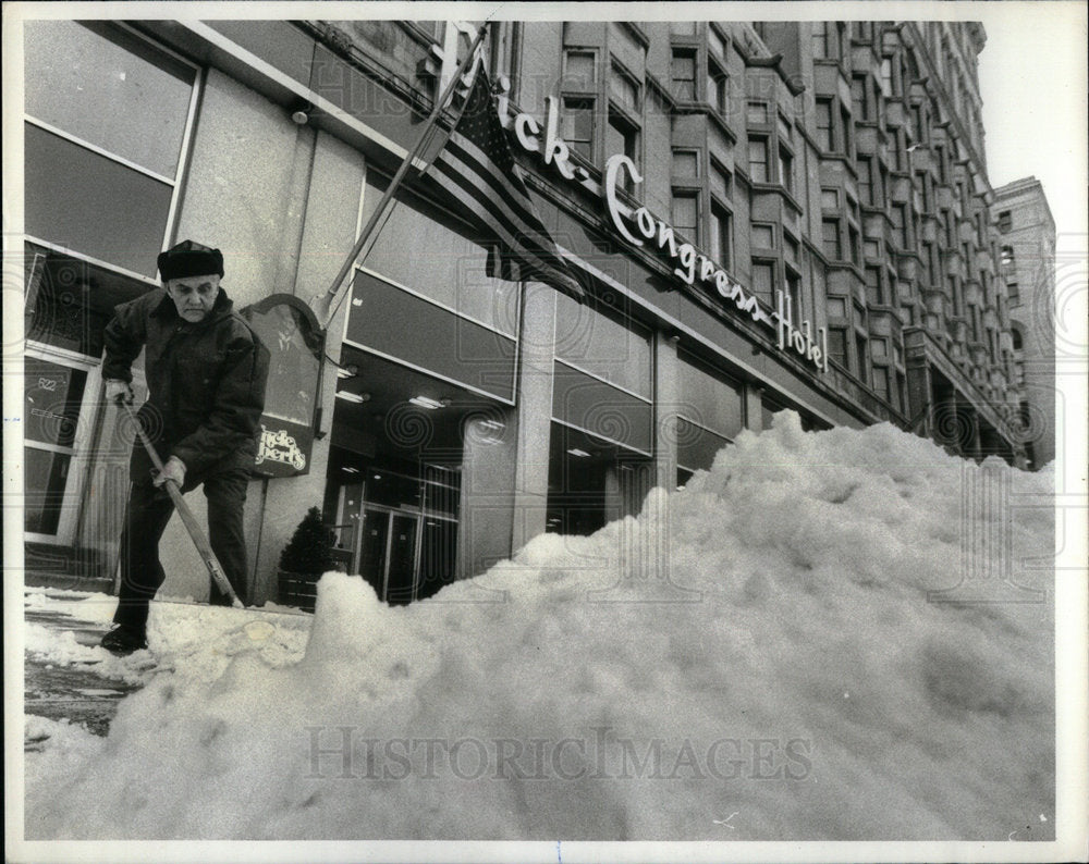 1979 Man Clears Snow At Pick-Congress Hotel - Historic Images