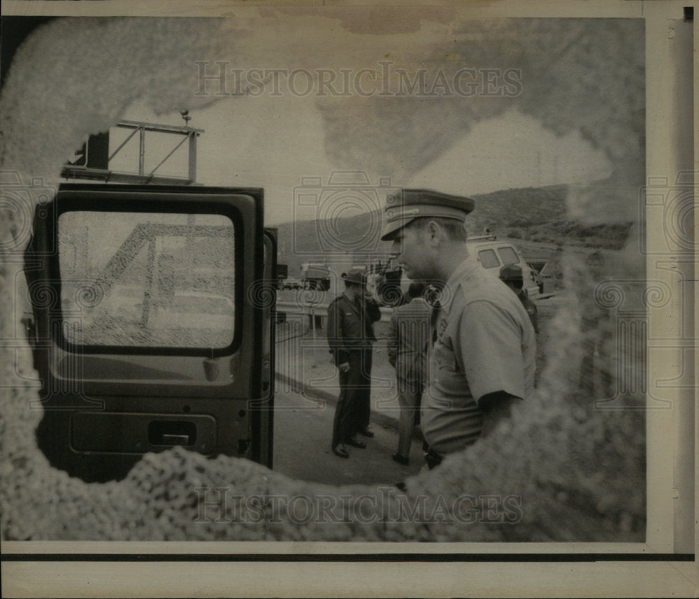 1973 Highway Patrolman Inspects Van - Historic Images