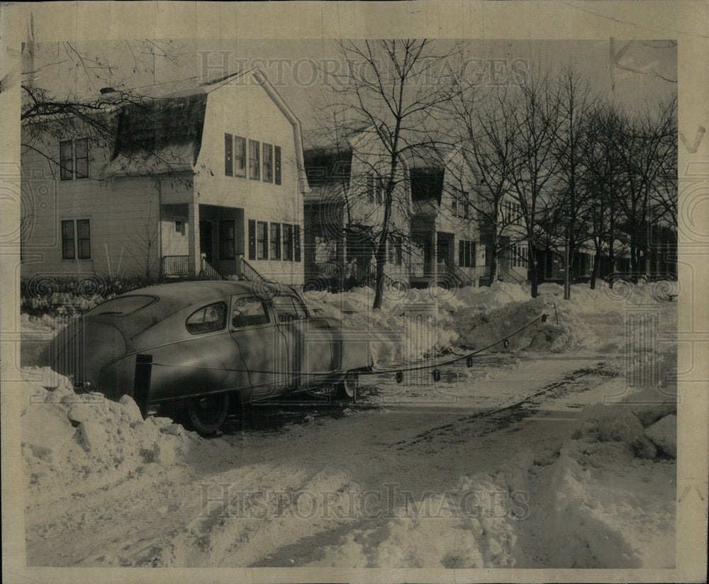 1957 Wilson snow labors parking space car - Historic Images