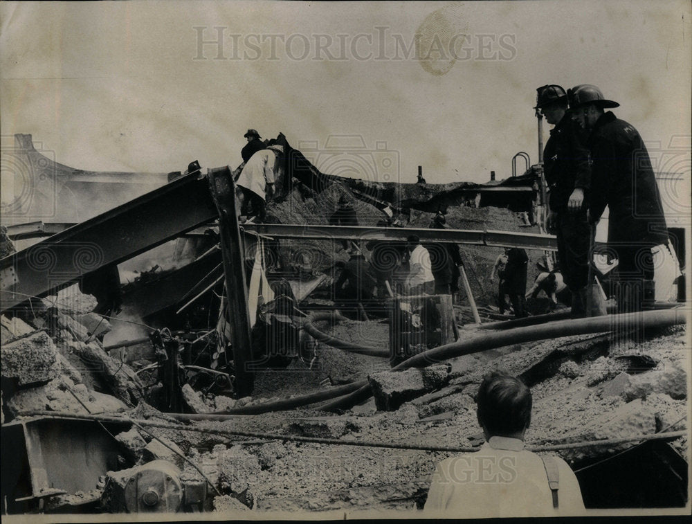 1968 Firemen search victim Explosion Wood - Historic Images