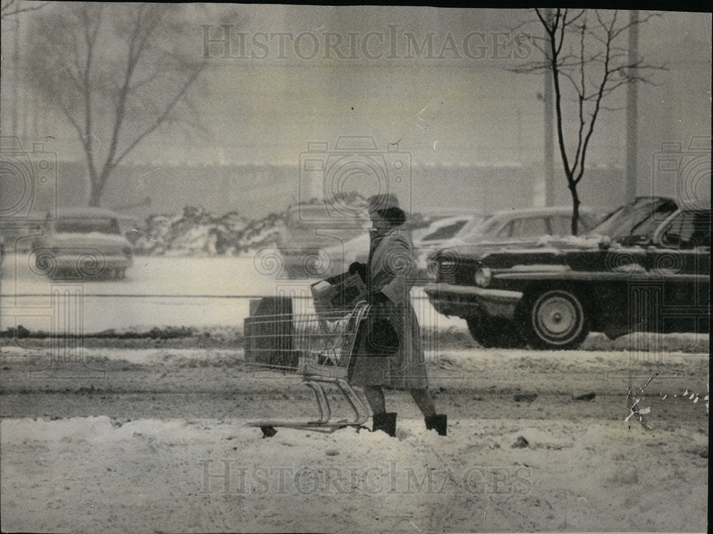 1965 Shopper Pushing Cart in Thick Snow - Historic Images