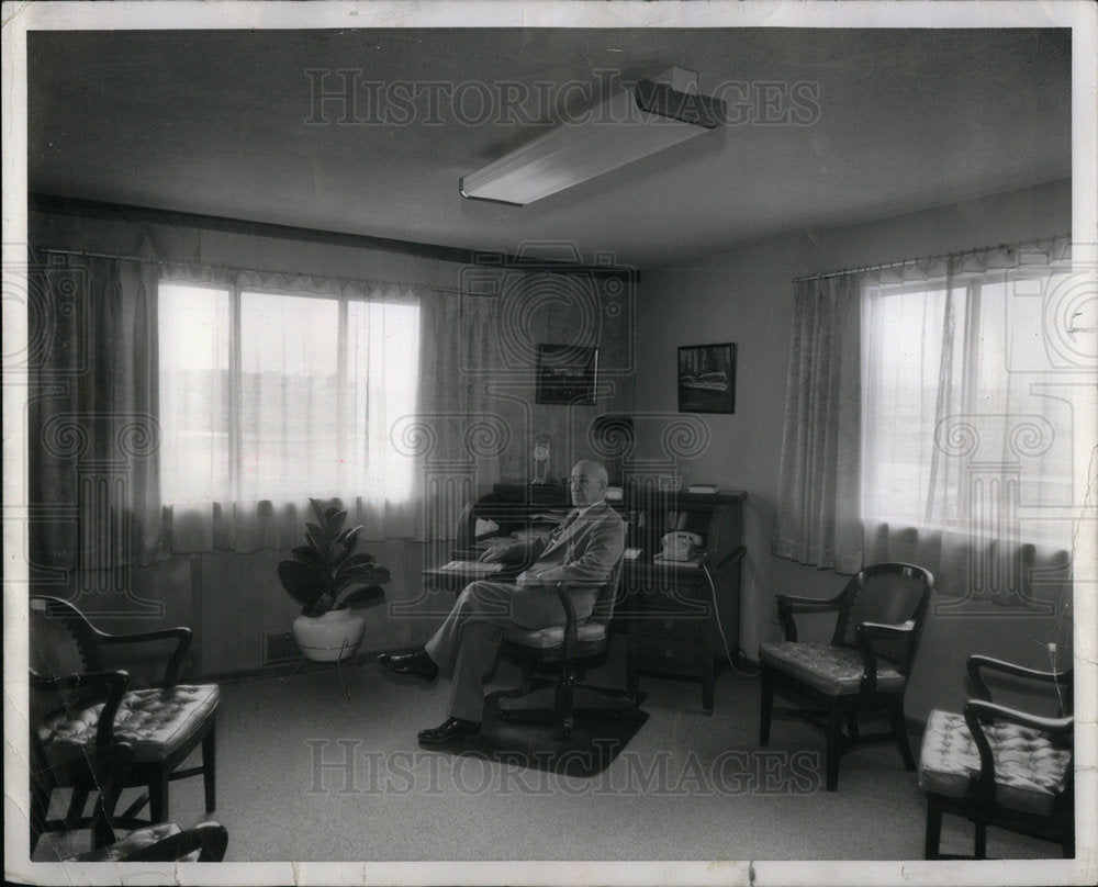 1960 Chester T. French in his office. - Historic Images