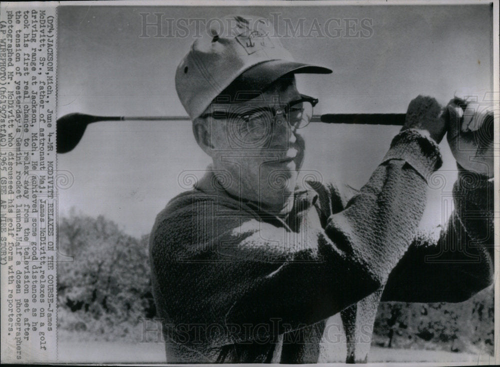 1966 James McDivitt Sr. father golf launch - Historic Images