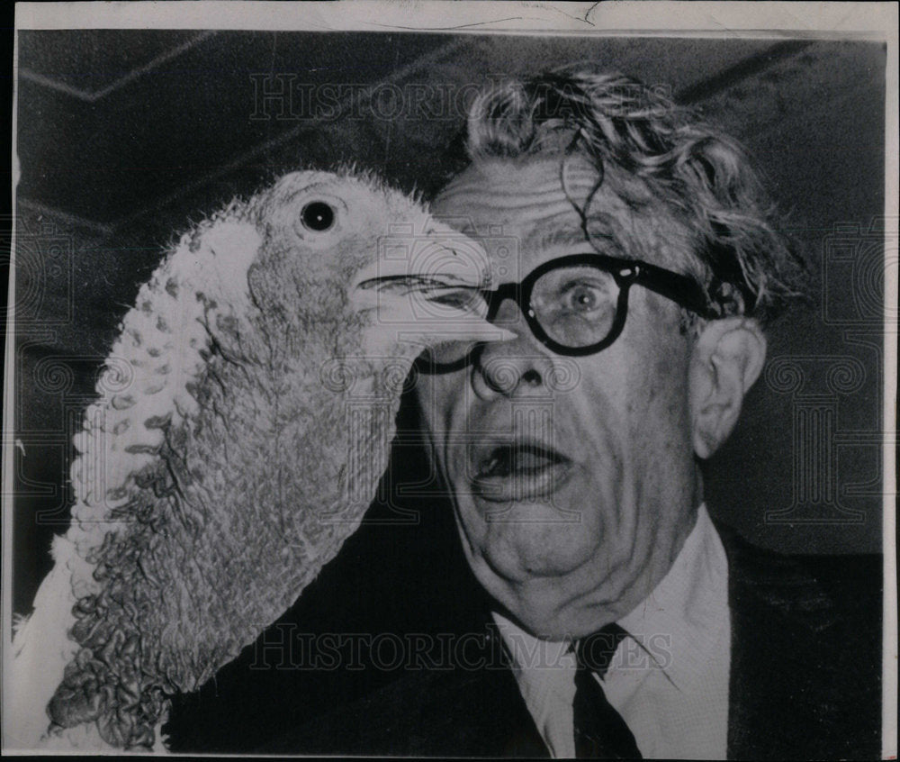 1966 Everett Dirkson with a turkey - Historic Images