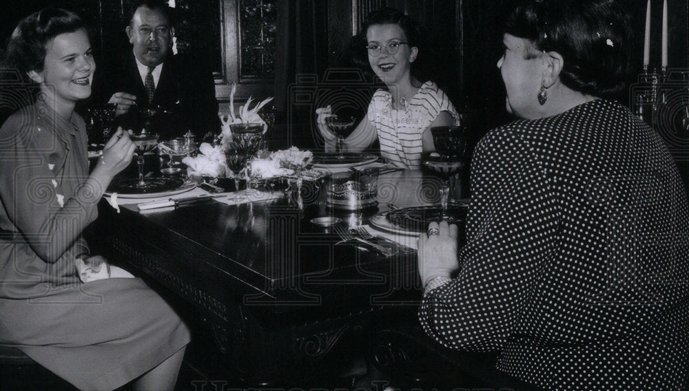 1946 Sociallite Lie At Dinner With Family - Historic Images