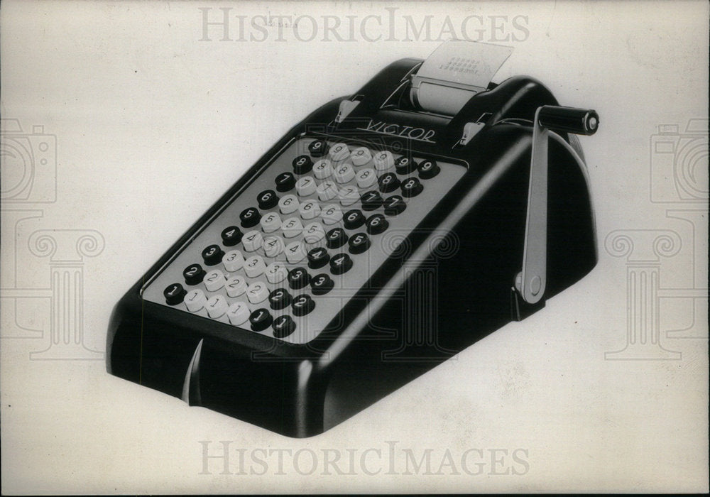 Picture of an adding machine. - Historic Images