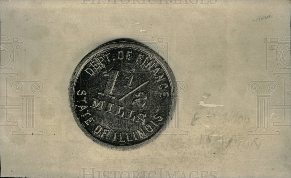 1937 Press Photo Illinois state tax token - Historic Images