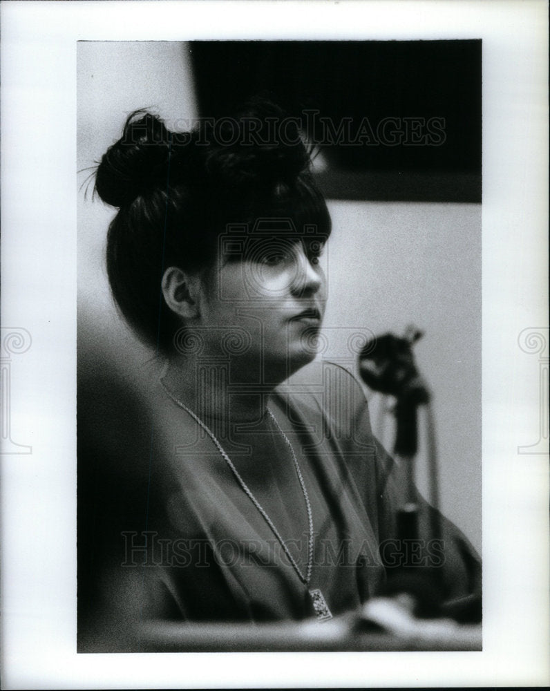 1991 Press Photo Antoinette stand melon dress bangs - Historic Images