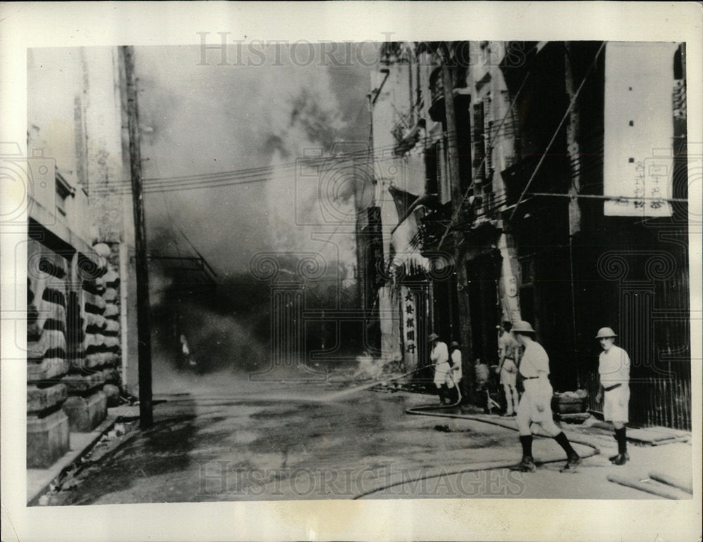 1938 Press Photo Flames Threaten Foreign Residents - Historic Images