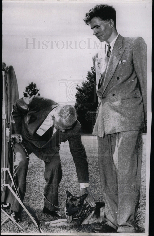 1951 Press Photo Secretary of Defense receives puppy - Historic Images