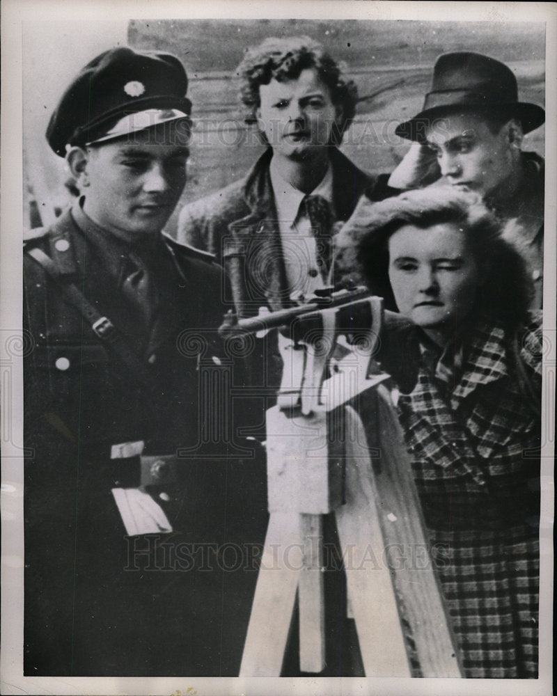 1953 Iron Curtain communist girl rifle aim - Historic Images