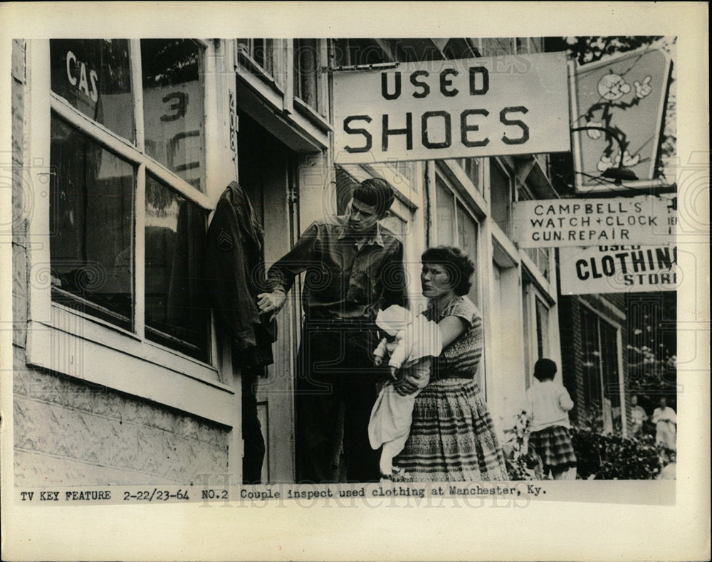 1964 Photo People Inspect Used Clothes In Kentucky - Historic Images