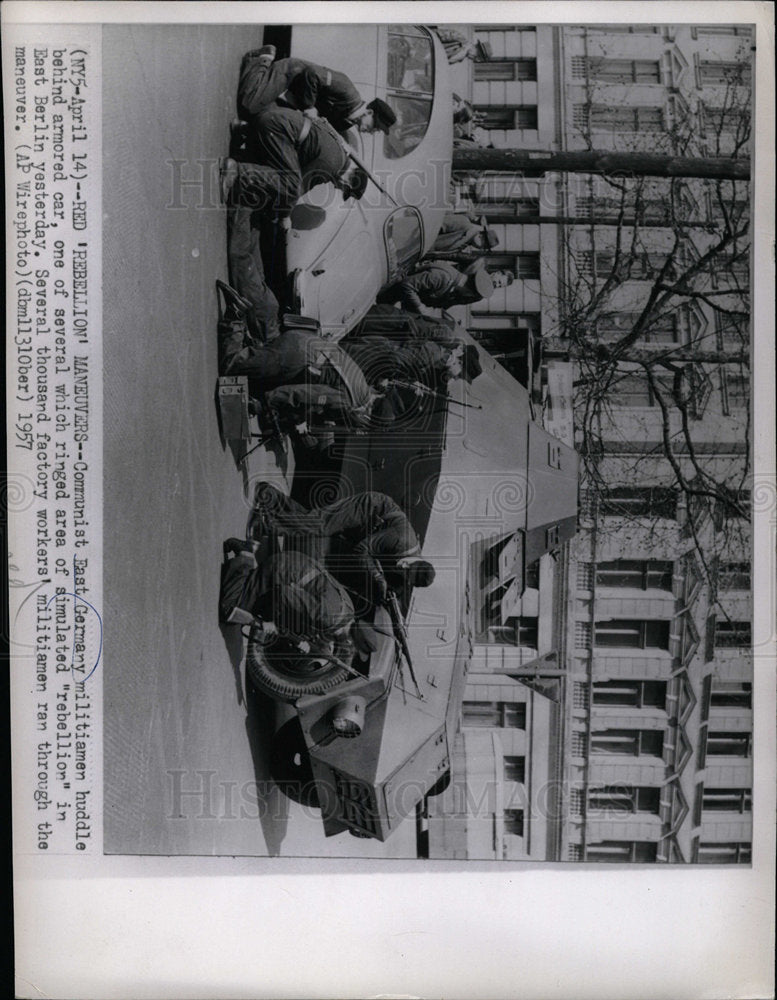 1957 Press Photo Militiamen Huddle Behind Armored Car - Historic Images