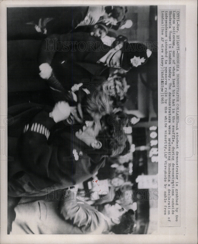 1965 Press Photo Student Demonstrator Collared London - Historic Images