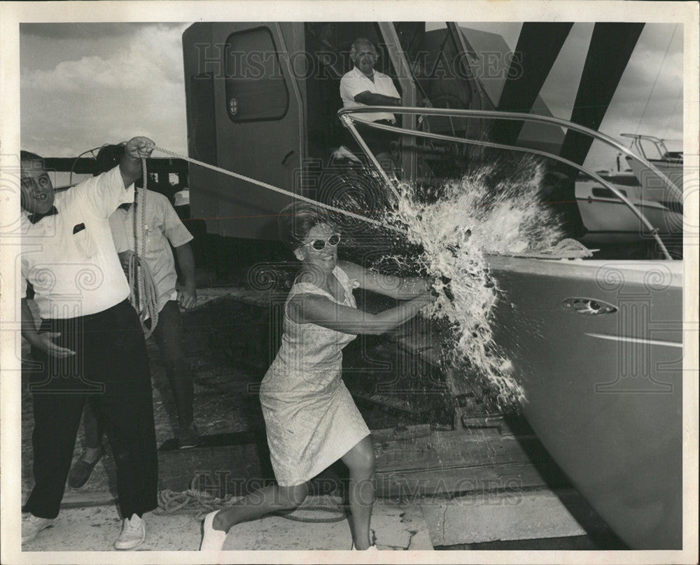 1969 Press Photo Mrs. Charles Foley Christens New Boat - Historic Images