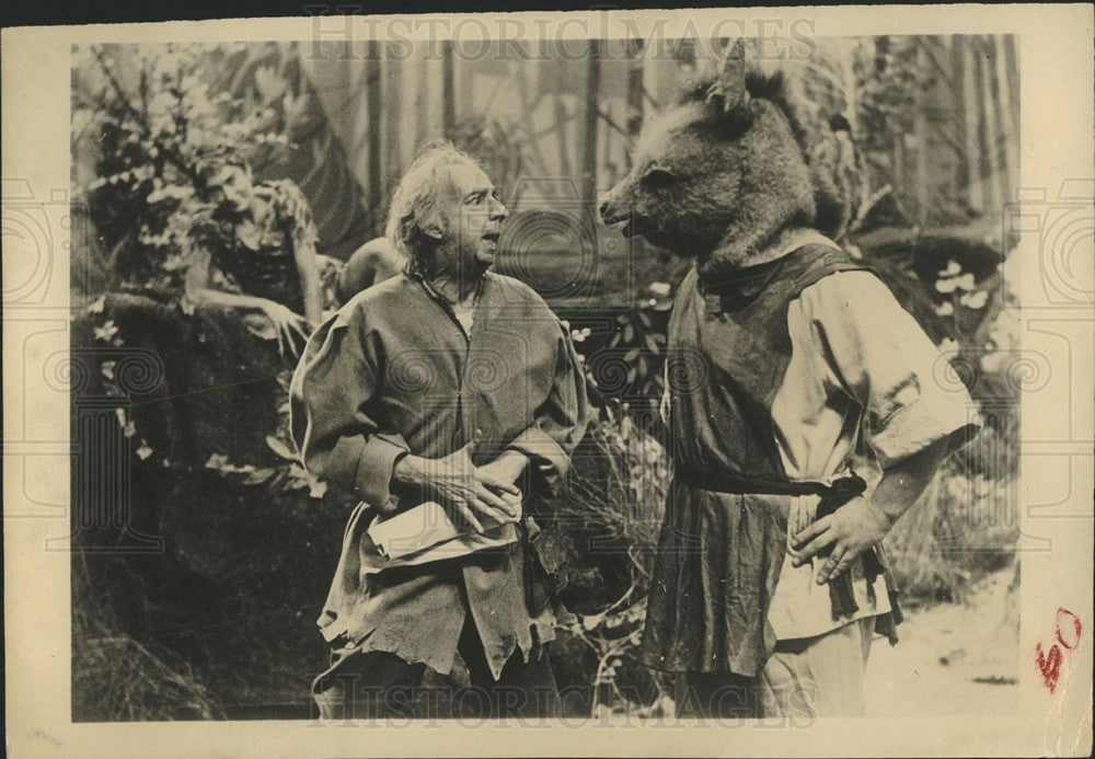 Press Photo A man talking with a wolf character - Historic Images