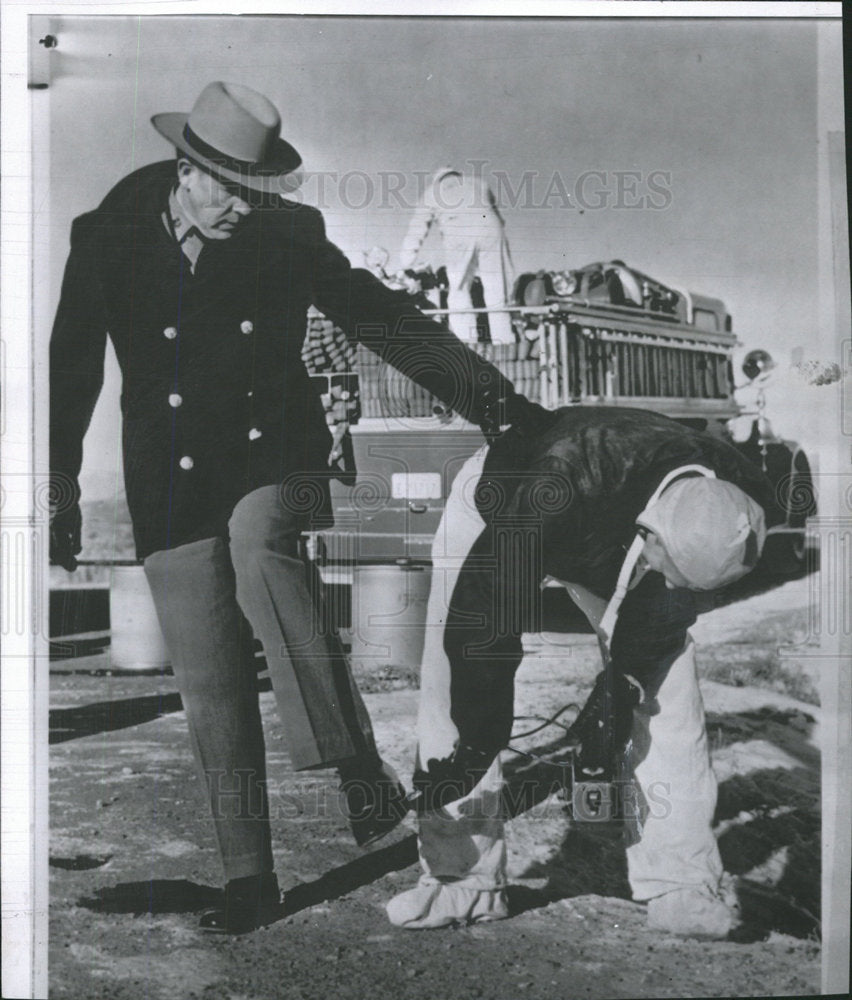 1961 Press Photo Check Radiation Blast Scene Shoes Show - Historic Images