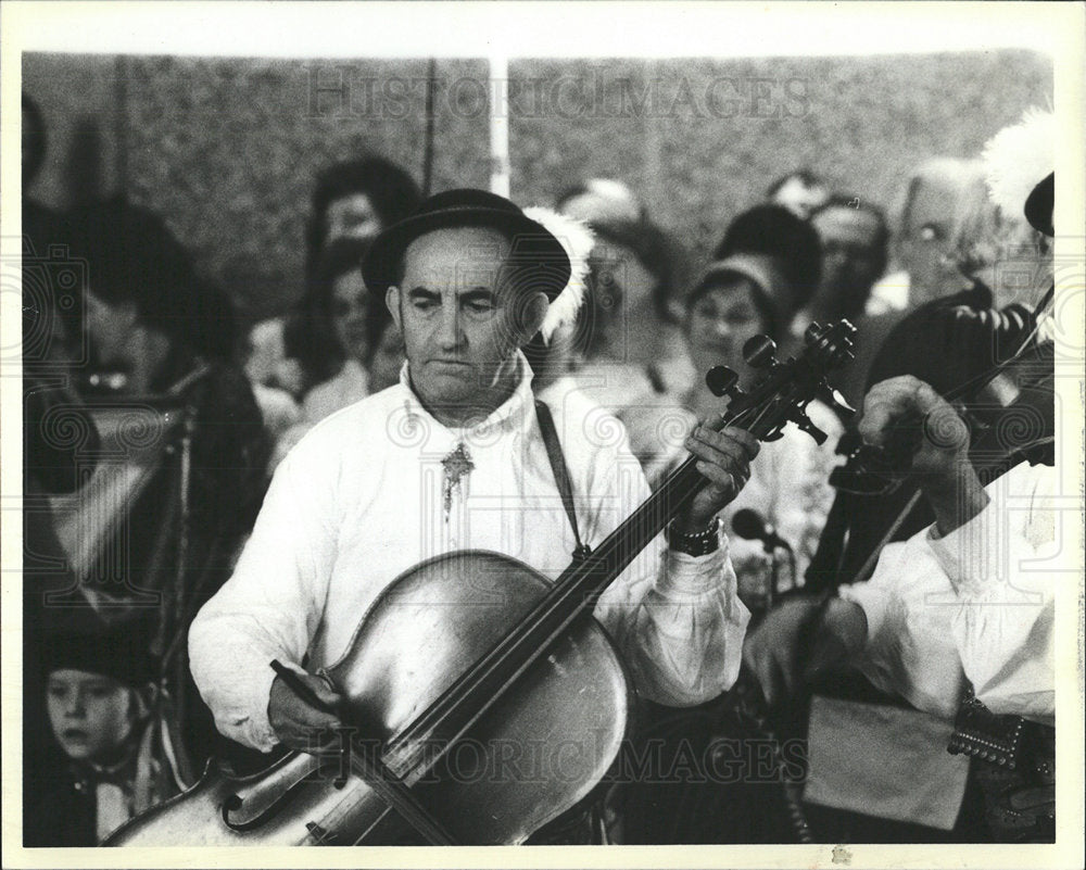 1984 Press Photo Millard employee Cello Instrument Play - Historic Images