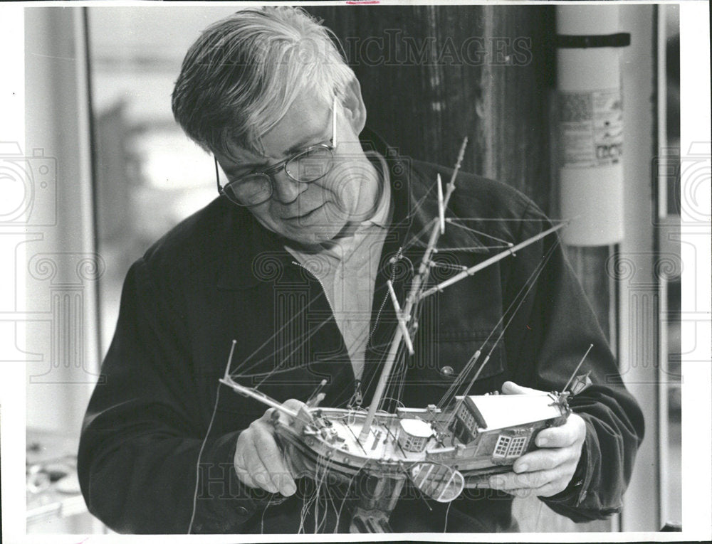 1990 Press Photo Man Working Ship Model Maritime Fest - Historic Images