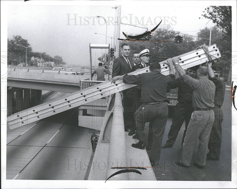 1965PressPhoto30-foot Aluminum ladder for Fire Fighters - Historic Images