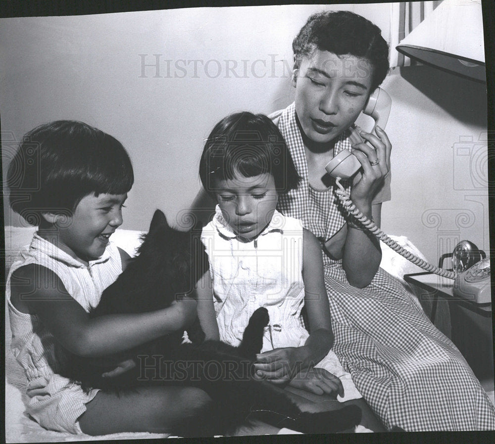 1959 Press Photo Missing Pilot Family Playing With Cat - Historic Images