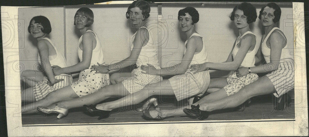 1928 Courtney Heller sits with women-Historic Images