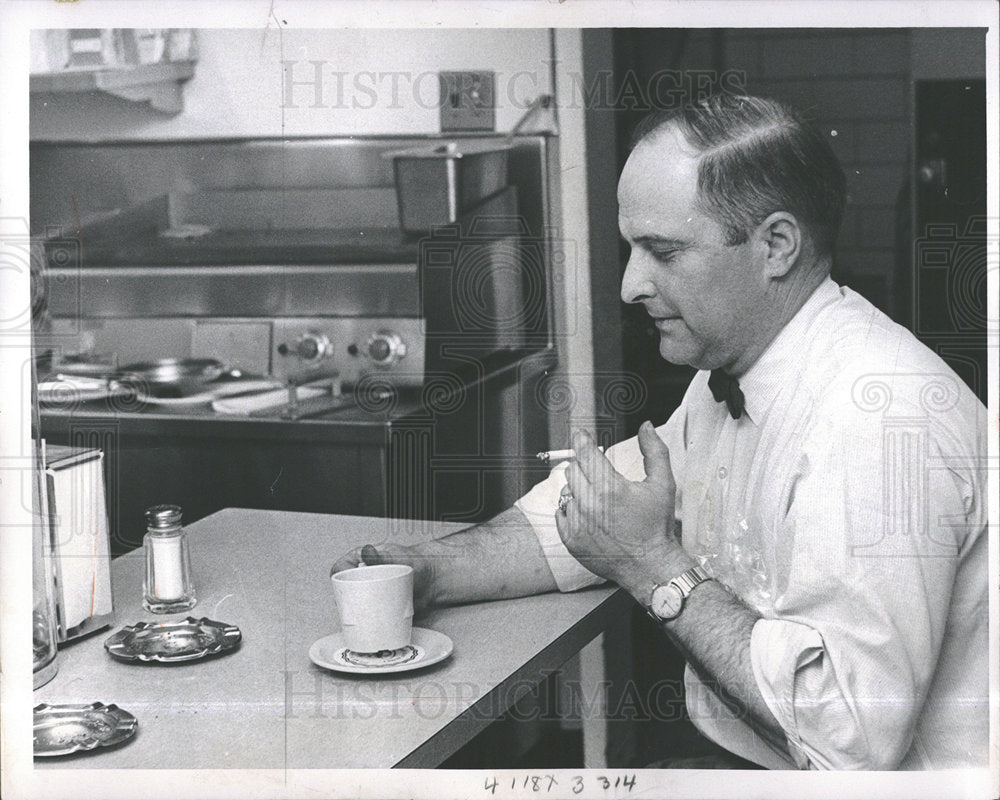 1963 Press Photo Heart George Kucal smoking Coffee  - Historic Images
