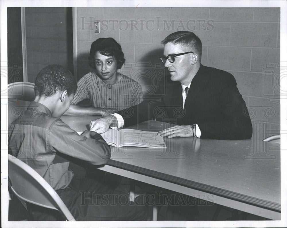 1966 Press Photo Man Woman Tutor Student Boy Book - Historic Images