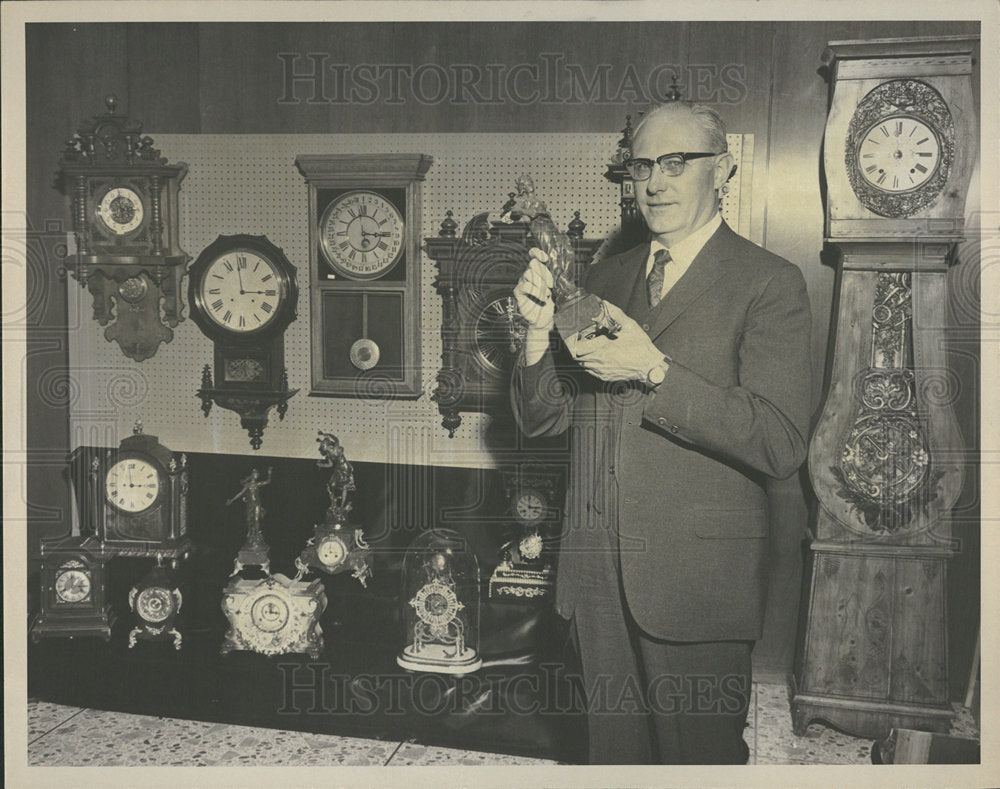 1969 Press Photo John Hershner Shows Bank&#39;s Clocks - Historic Images