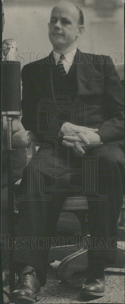Old black white folder man in suit sitting - Historic Images