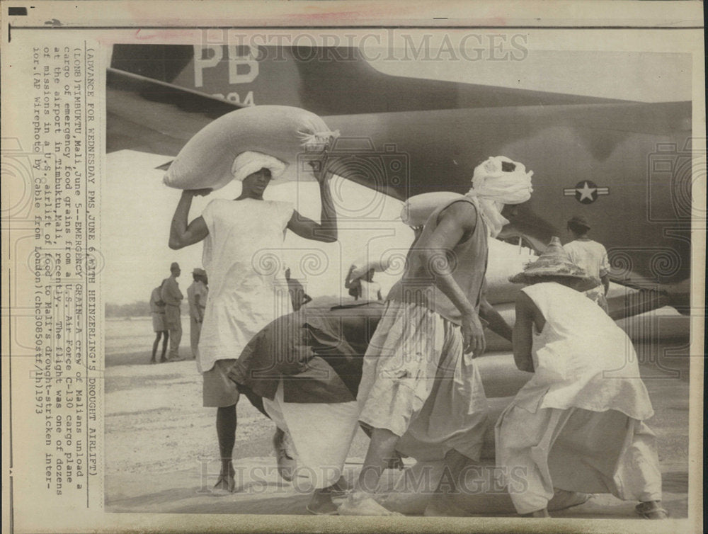 1973 Press Photo US Air Force food grains Cargo plane - Historic Images