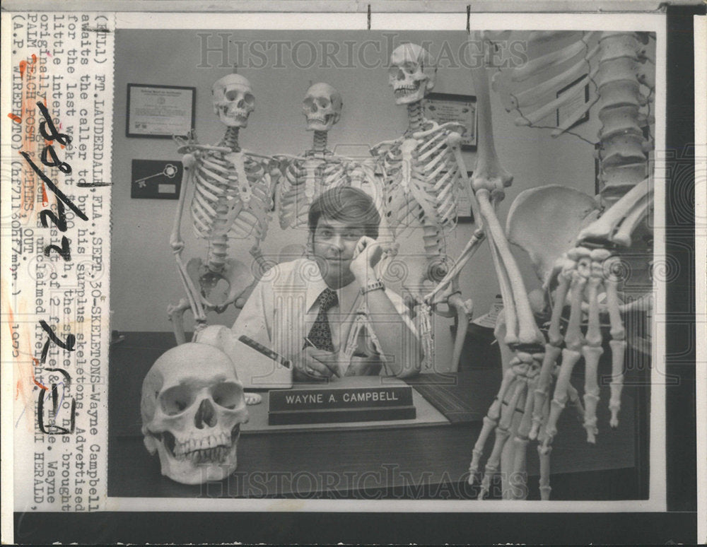 Wayne Campbell Awaits Surplus Skeletons to Sell. - Historic Images