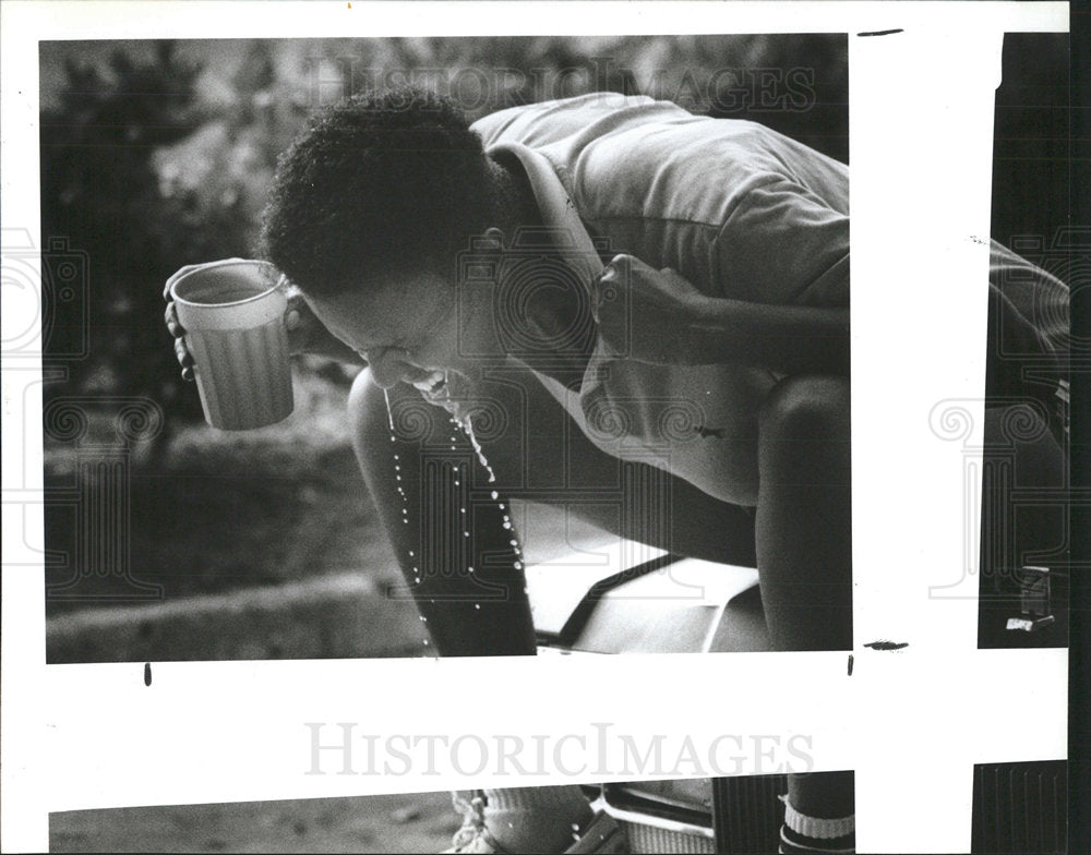 1990 Press Photo Twila Gardner hit with water - Historic Images