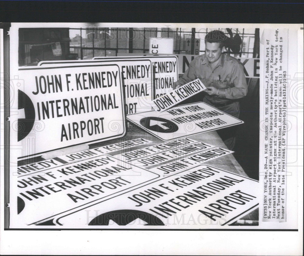 1963 Press Photo J.P Bohan Inspects Airport Signs - Historic Images