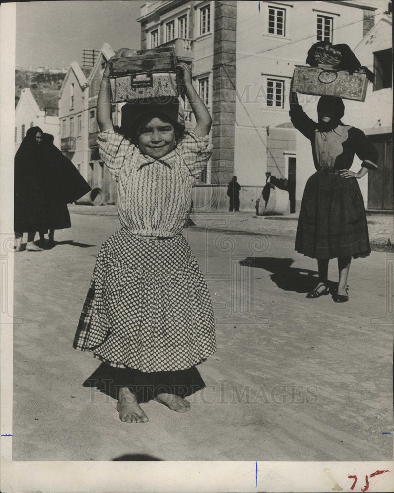 1954 Portuguese Girl Bundle Balancing - Historic Images