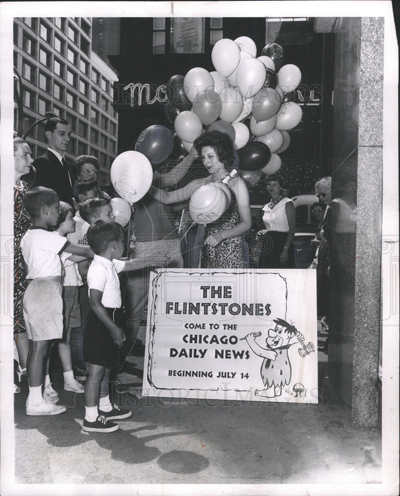 1962 Press Photo Fred Flintstones pal Barney balloons  - Historic Images