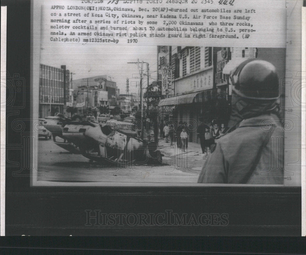 1970 Press Photo Okinawan Riot policeman shells burn  - Historic Images