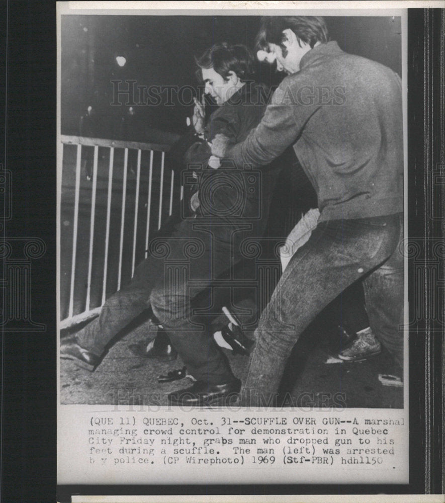1969 Press Photo Quebec City Grabs man marshal scuffle - Historic Images