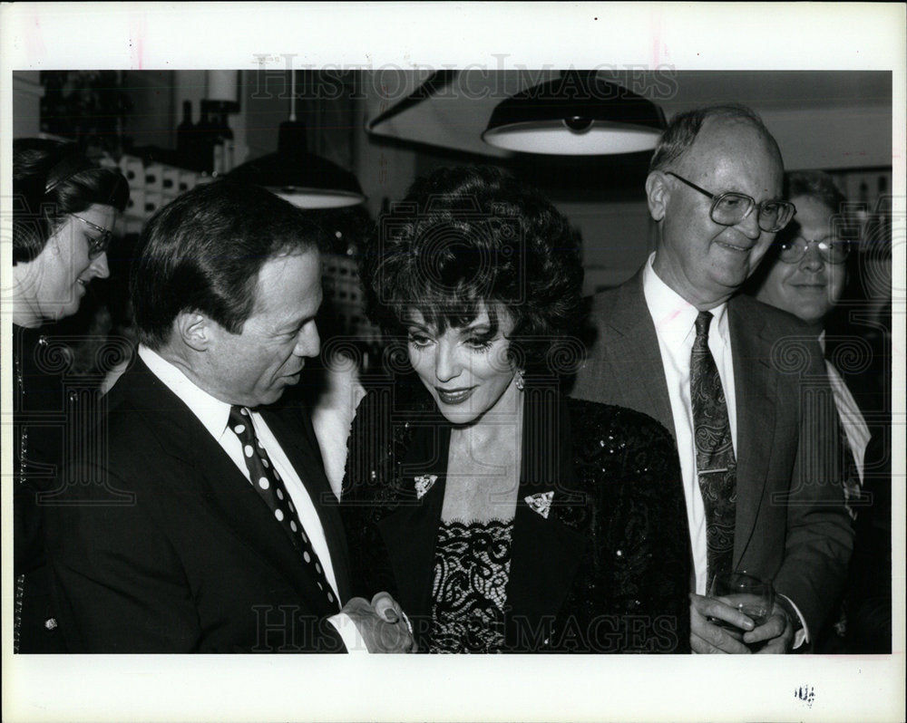 1991 Press Photo Joan Collins actress Sheldon Friedman  - Historic Images