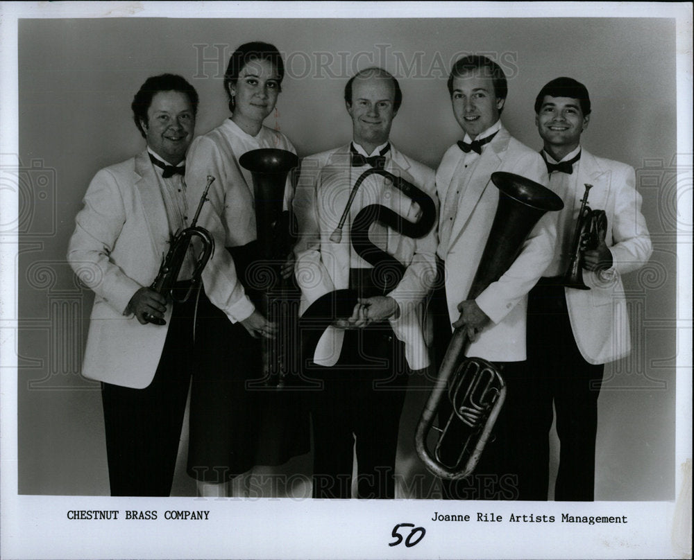 1990 Press Photo Chestnut Brass Co Art Skill Music Mich - Historic Images