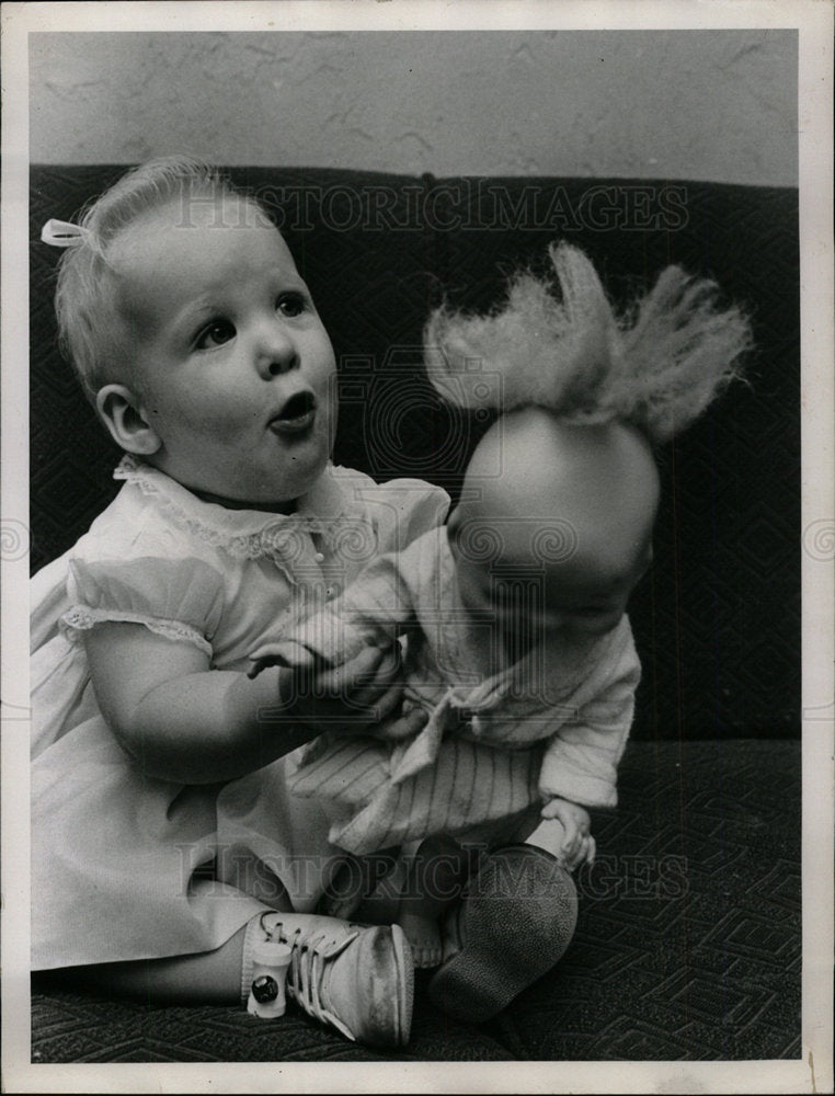 Press Photo  Baby Sandra Waits Adoption - Historic Images