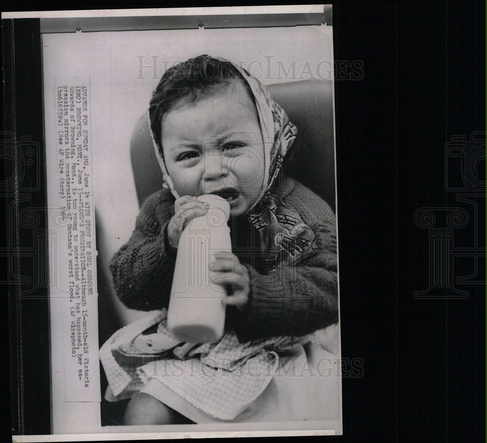 1964 Press Photo Little Girl Crying Holding Bottle - Historic Images