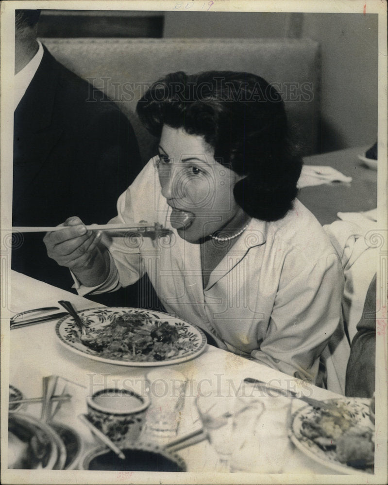 1960 Press Photo Woman Eating Food Chopsticks - Historic Images