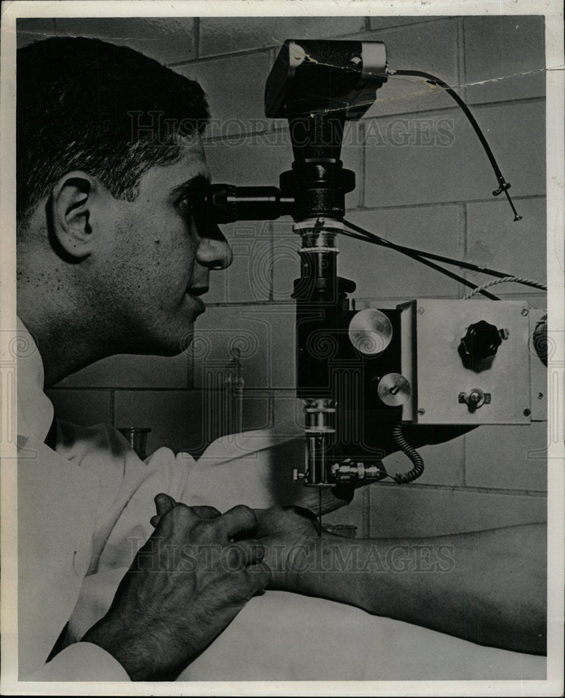 Charles Long Examines Living Tissue - Historic Images