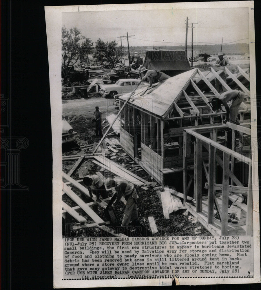 1957 Press Photo Carpenters Cameron Hurricane Buildings - RRY58819 - Historic Images