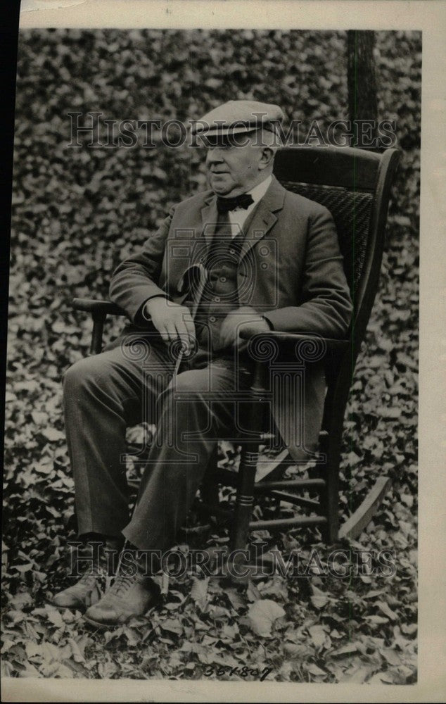 1923 Charles Murphy Outside On a Chair - Historic Images