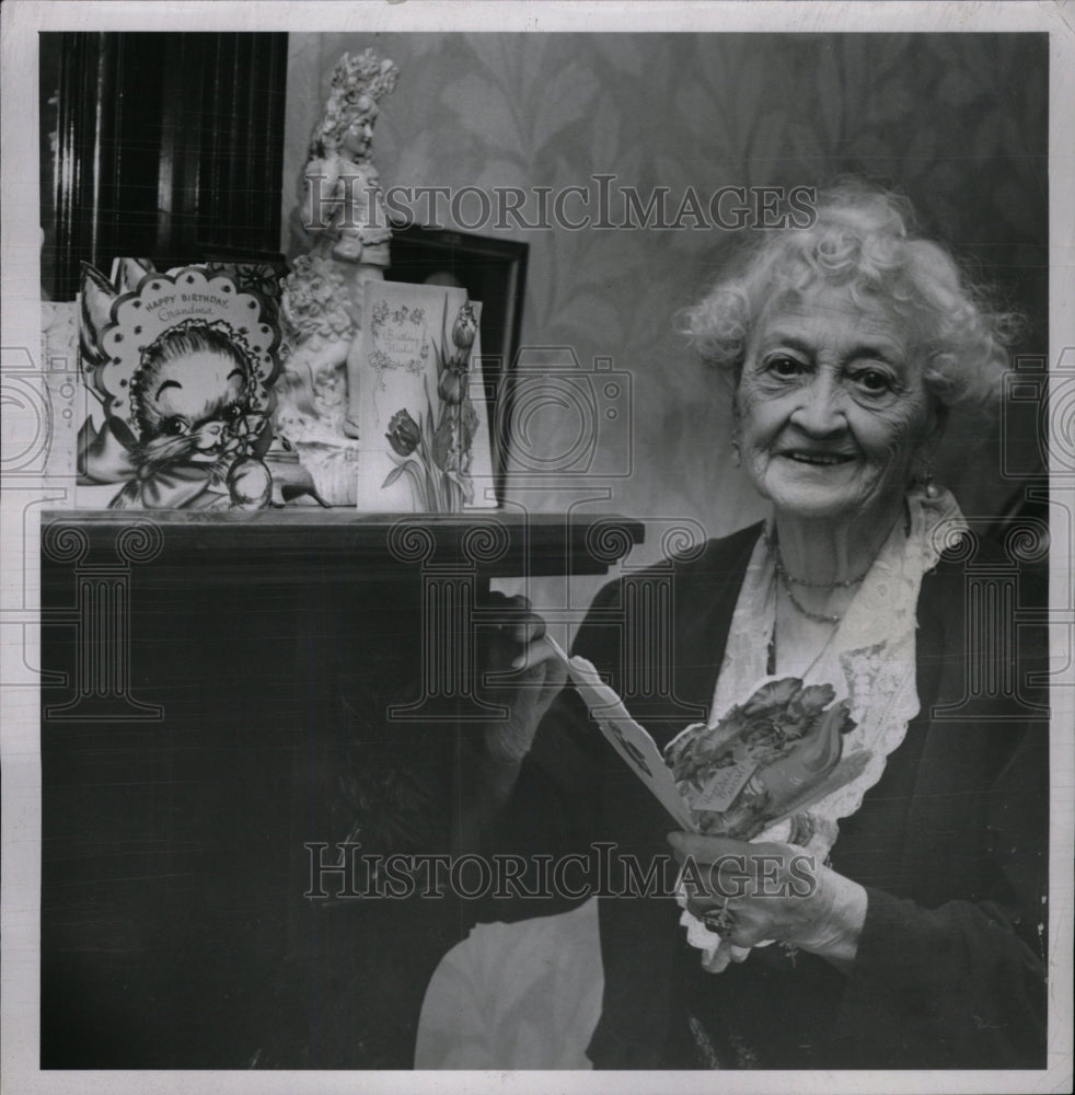 1950, Mary Butler Brown Holding A Card- RSA03157 - Historic Images