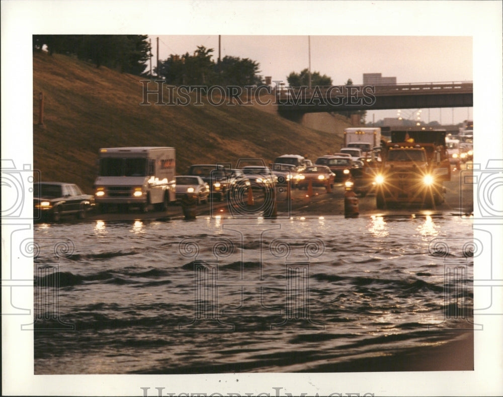 1991 One lane traffic flooded freeway elect - Historic Images